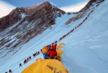 This photograph from 2021 shows mountaineers lined up as they climb a slope during their ascent to summit Mount Everest. Lakpa Sherpa/AFP/Getty Images/File